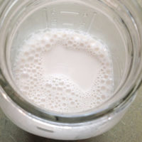 raw nut milk in glass jar
