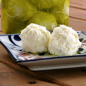 Middle Eastern Kefir Cheese Balls {with free video!} | In today's free video and recipe, I show you a traditional Middle Eastern method of preserving yogurt cheese that requires no refrigeration. My grandmother and namesake, Tata Wardee, who has passed away, always had jars full of yogurt cheese balls available to add to our plates at breakfast, lunch and dinner! | TraditionalCookingSchool.com