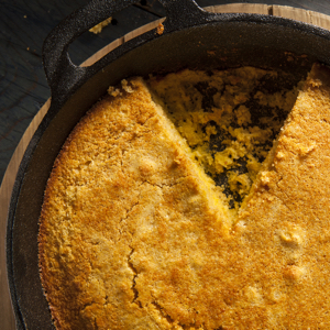 Bacon Buttermilk Skillet Cornbread | With our traditional off-grid lifestyle, it's only fitting that our family has created new Christmas and Thanksgiving traditions while still holding tight to old traditions. This moist and rustic skillet cornbread is one of those new traditions -- it's delicious! Perfect for special gatherings and ordinary dinners! | TraditionalCookingSchool.com