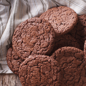 Spicy Chocolate Gingersnaps {gluten-free & egg-free} | This recipe for gluten-free and egg-free chocolate gingersnaps is adapted from Nourishing Traditions. I liked that it used sprouted crispy almonds and arrowroot flour, making it easier to digest. I couldn't fathom a gingersnap without molasses. And all things seem to be better with chocolate. They will forever be on our list of Christmas cookies to make each year! | TraditionalCookingSchool.com