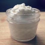 Whipped Body Butter | It's not frosting, but it does look good enough to eat. This whipped homemade body butter is thick and rich. It nourishes the skin with just a few ingredients like shea butter and essential oils. | TraditionalCookingSchool.com