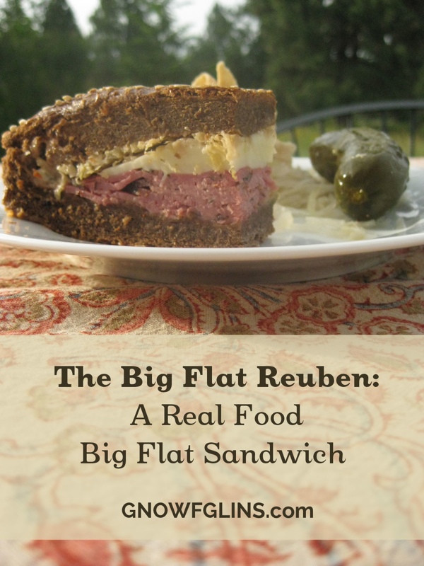 The Big Flat Real Food Reuben Sandwich | Who knew that making a big honkin' loaf-sized sandwich and flattening it under cement blocks, rocks, or gym weights could be so fun (or so delicious)? I'd seen other Big Flat Sandwiches around the internet, but when Wardee first presented the idea of making a real food Big Flat Sandwich, I immediately knew I needed to try my all-time favorite sandwich -- the Reuben. | TraditionalCookingSchool.com