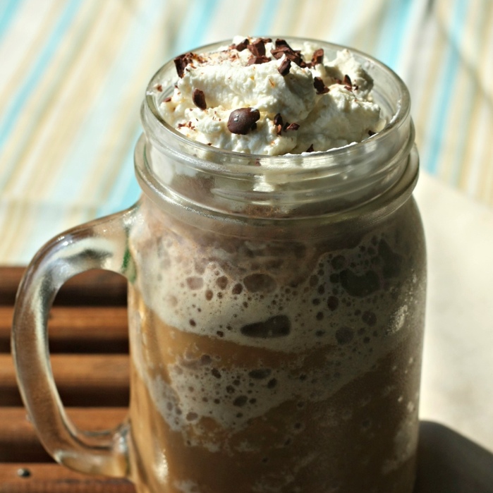 Frozen Mocha Chicoccino | Made with a brew of roasted chicory root, ice, raw milk or your favorite dairy substitute, roasted cacao powder, and a bit of rapadura sugar, then topped with a spoonful of whipped cream and some cacao nibs, this cold drink makes a great summer afternoon treat! | GNOWFGLINS.com