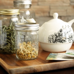 How to Grow Your Own Herbs for Tea {even in a small space} | Herbal tea is easy and rewarding to grow yourself. Many tea herbs are easy-to-grow and do well in pots and small spaces, so you can enjoy delicious home-grown tea year-round. Although you can make tea out of almost any herb, here are five (plus one more) of my favorites for both large and small gardens! | TraditionalCookingSchool.com
