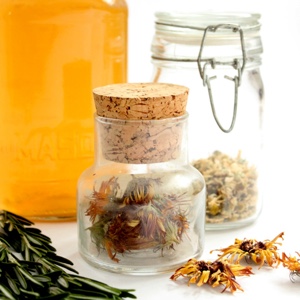 Easy Homemade Herbal Hair Rinses for Beautiful, Healthy, Hair | Drugstore shelves are full of products that promise to give us healthy, manageable, shiny, smooth, strong, and beautiful hair. The problem is, most of those bottles are filled with anything-but-healthy chemicals. Thankfully, we need look no further than our own kitchens, gardens, or local herb shops to find natural, organic care for truly healthy locks! | TraditionalCookingSchool.com