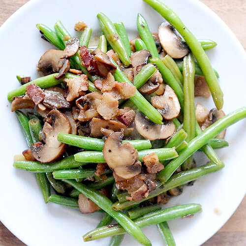 Green Beans with Bacon & Mushrooms | Sick of green bean casserole that uses canned cream of mushroom soup? Want a Real Food version instead? My family enjoys this recipe throughout the year -- especially during the holiday season. No canned mystery soups necessary! | TraditionalCookingSchool.com