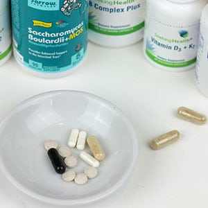 If suffering from sypmtoms of Hashimotos Thyroiditis (or thyroid disease), what's the best way to heal? Especially when the thyroid is the metabolic and hormone control center for the entire body! Consider these top five beneficial supplements for Hashimoto's alongside a healing diet. You'll be on your way to a balanced thyroid and the weightloss or weight gain that's desired. #hashimotos #diet #supplements #healing #weightloss #tradcookschool