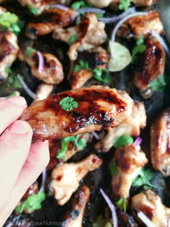 Tex-Mex chicken wings with cilantro, honey BBQ, and onions