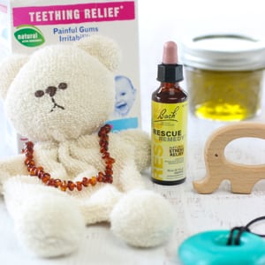 11 Natural Teething Remedies That Really Work (including an easy herbal rub-on!) | To prepare for teething and avoid over-the-counter pain medicine, I'm prepared with 11 natural teething remedies that really work -- including DIY chamomile and catnip herbal rub-on and a couple of items you may already have in your fridge! | TraditionalCookingSchool.com