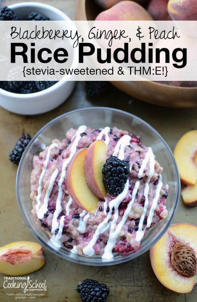 bowl of rice pudding garnished with peaches and blackberries