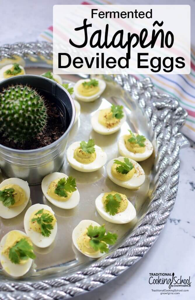 deviled eggs on silver platter