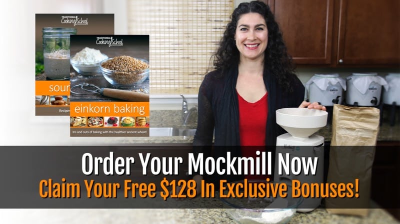 woman standing in kitchen next to a Mockmill, offering free eBooks with purchase of a Mockmill through January 21st, 2019