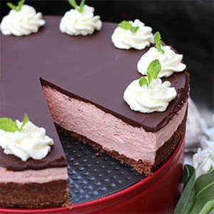 Are you looking for the best winter holiday cheesecake recipe? This is it! This No-Bake Peppermint Cheesecake is light, yet rich and satisfying, with a chocolate ganache topping. It's egg-free, grain-free, gluten-free, refined sugar-free, and has a low-carb option -- perfect for anyone, as long as you can have dairy!
