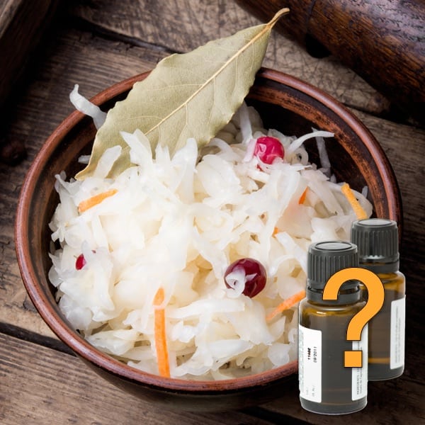 sauerkraut in dark bowl on wooden table