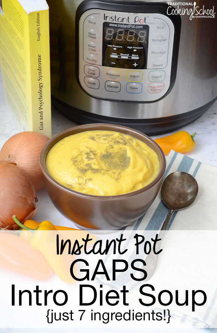 bowl of yellow blended soup with Instant Pot in the background