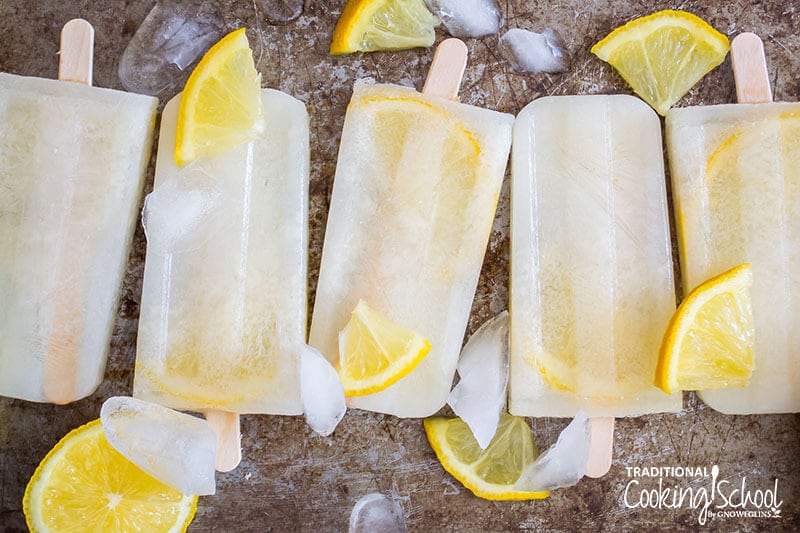 2-ingredient thm keto lemon popsicles with fresh lemon and ice cubes