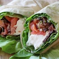 lettuce wrap with cream cheese, bacon, sprouts, and tomatoes
