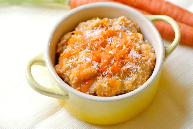 small yellow bowl of moist carrot cake quinoa flakes for breakfast
