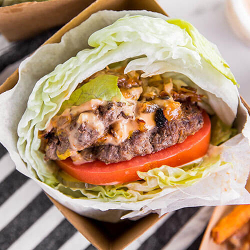 photo of a healthy knockoff recipe of the double double animal style burgers from In N Out, with a lettuce bun
