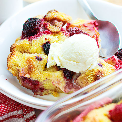 Looking for the best dessert recipes? You’re in luck! This Mixed Berry Bread Pudding calls for airy bread, creamy custard, coconut sugar, and your favorite fresh or frozen berries. Serve warm or cold for breakfast, or with vanilla ice cream or caramel sauce for an easy, amazing treat! Bonus: I've included seasonal variations so you can make this bread pudding recipe year round! #recipe #dessert #bread #breadpudding #oldfashioned