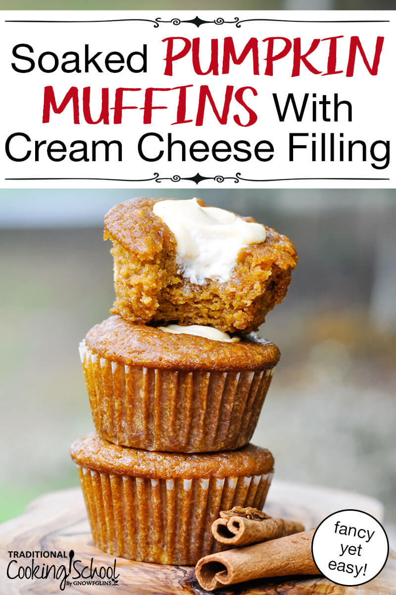 stack of three pumpkin muffins with cream cheese filling, on a platter made out of the cross-section of a tree trunk, next to two cinnamon sticks, with text overlay: "Soaked Pumpkin Muffins With Cream Cheese Filling (fancy yet easy!)"