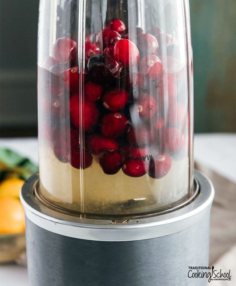 fresh cranberries, water, and lemon juice in a blender
