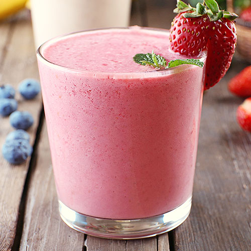 small glass cup of probiotic strawberry kefir smoothie
