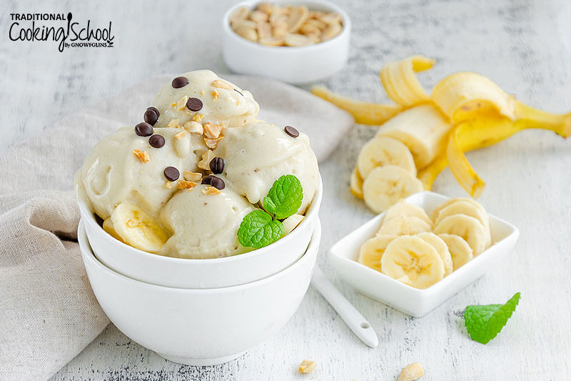 banana ice cream in a dish sprinkled with chocolate chips