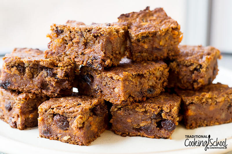 allergy friendly carrot cake bars stacked on top of each other