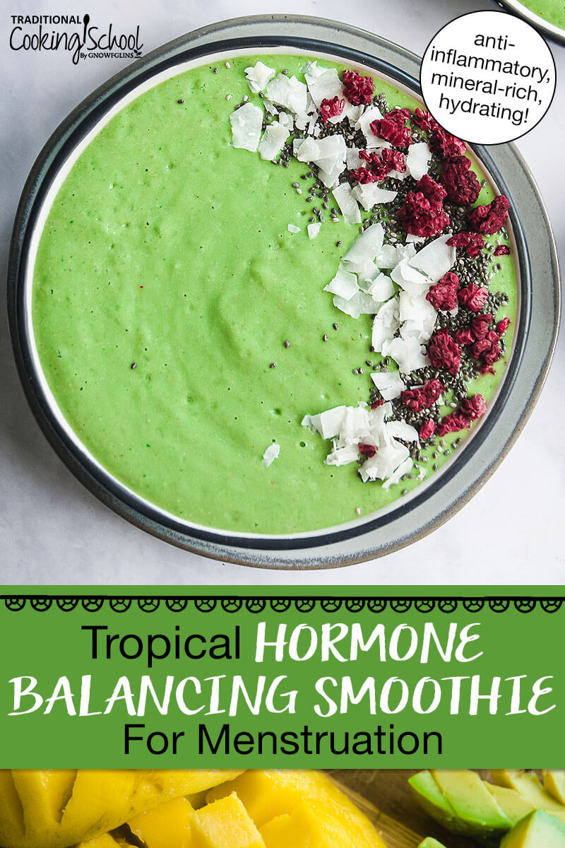 bright green smoothie bowl garnished with coconut, freeze-dried raspberries, and chia seeds. Text overlay says: "Tropical Hormone Balancing Smoothie For Menstruation (anti-inflammatory, mineral-rich, hydrating!)"
