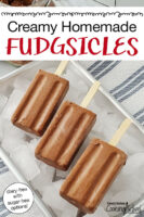 chocolate popsicles arranged on an tray of ice cubes. Text overlay says: "Creamy Homemade Fudgesicles (naturally sweetened and dairy-free!)"