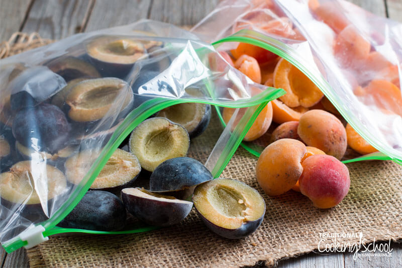 Plums and apricots in freezer bags.