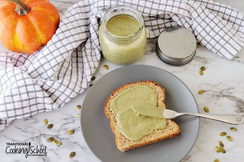 pumpkin seed butter spread on a piece of toast