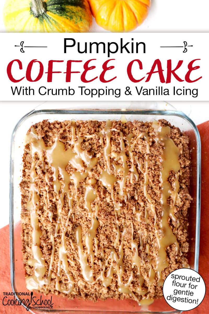 Cake in a square glass baking dish with a caramel-colored drizzle. Text overlay says: "Pumpkin Coffee Cake With Crumb Topping & Vanilla Icing (sprouted flour for gentle digestion!)"