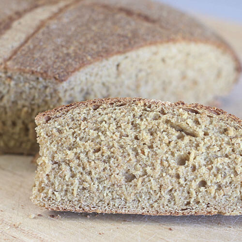 Slice of whole grain sourdough bread.