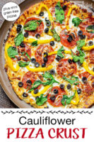 Close-up of a cauliflower pizza on a baking tray topped with fresh veggies and meats. Text overlay says: "Cauliflower Pizza Crust Recipe (plus mini grain-free pizzas)"
