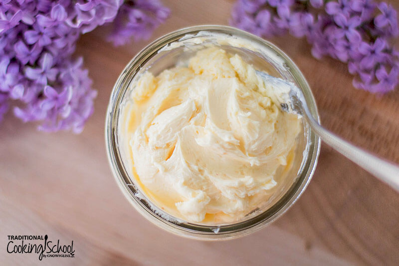 Butter in a small glass jar.