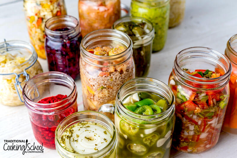 Wide variety of colorful ferments in glass jars.