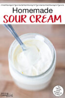 Thickened sour cream in a glass jar. Text overlay says: "Homemade Sour Cream (for tacos, chili, soups & more!)"