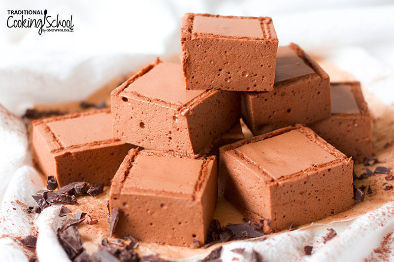 Homemade chocolate marshmallows in a stack, conveying the benefits of gelatin in a yummy treat!