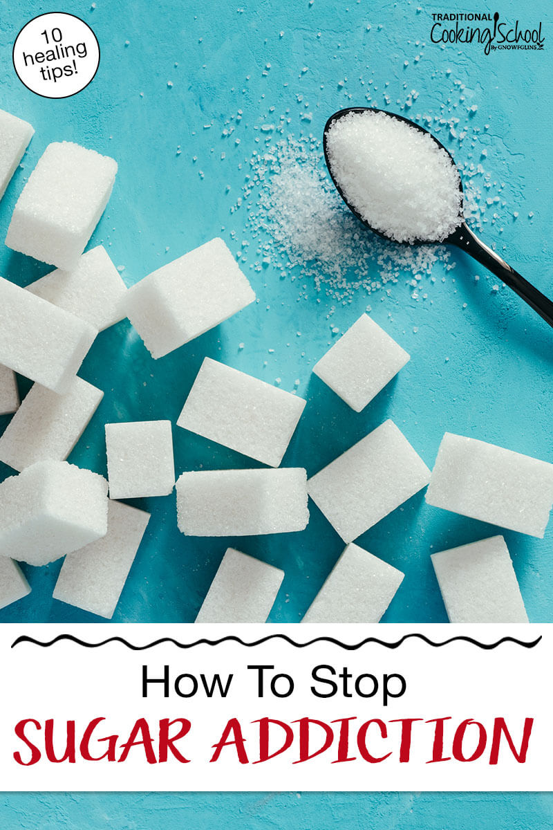 Sugar cubes on a turquoise background next to a spoonful of granulated sugar. Text overlay says: "How to Stop Sugar Addiction (10 healing tips!)"