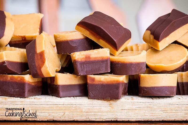 Chocolate nut butter cups in a jumbled pile.