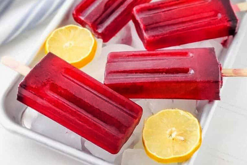 Homemade hibiscus and lemon popsicles.