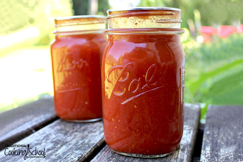 Canned tomato sauce in jars.