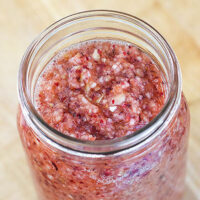 Cranberry orange relish in a glass jar.